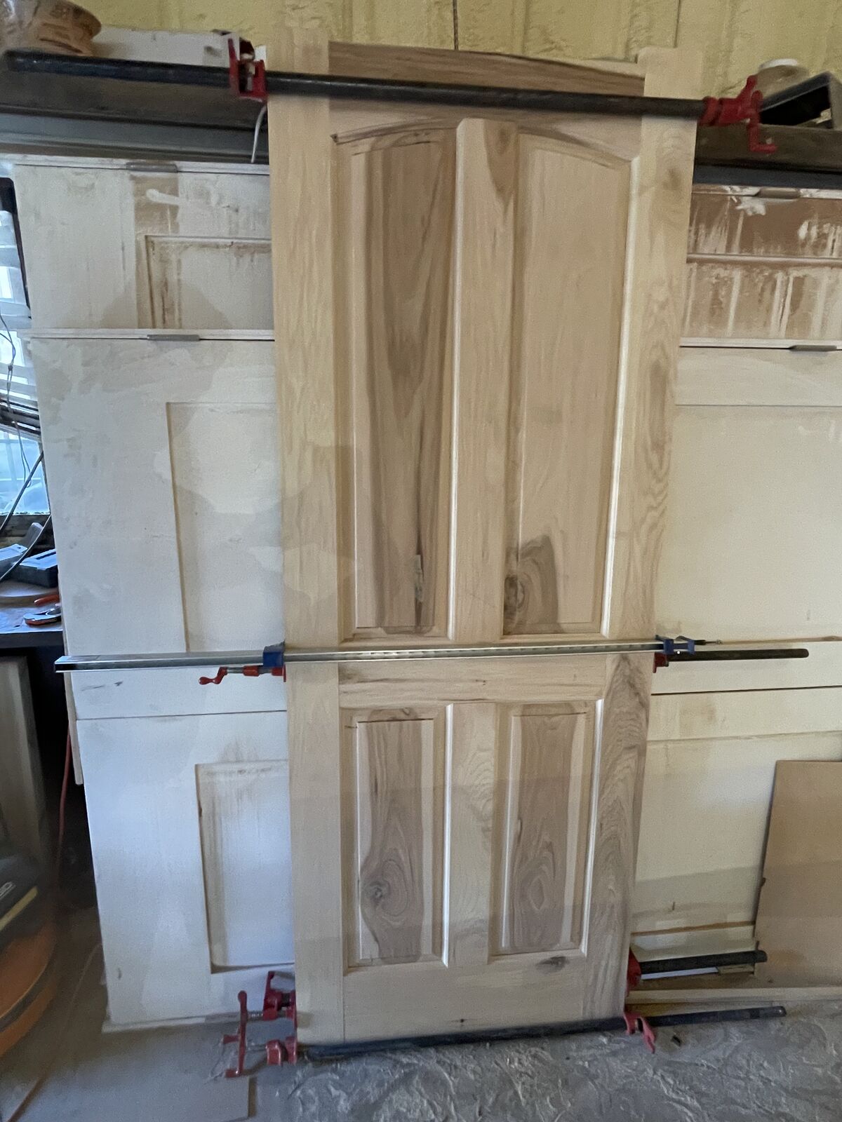 Custom hickory door installed by Smith Construction Services